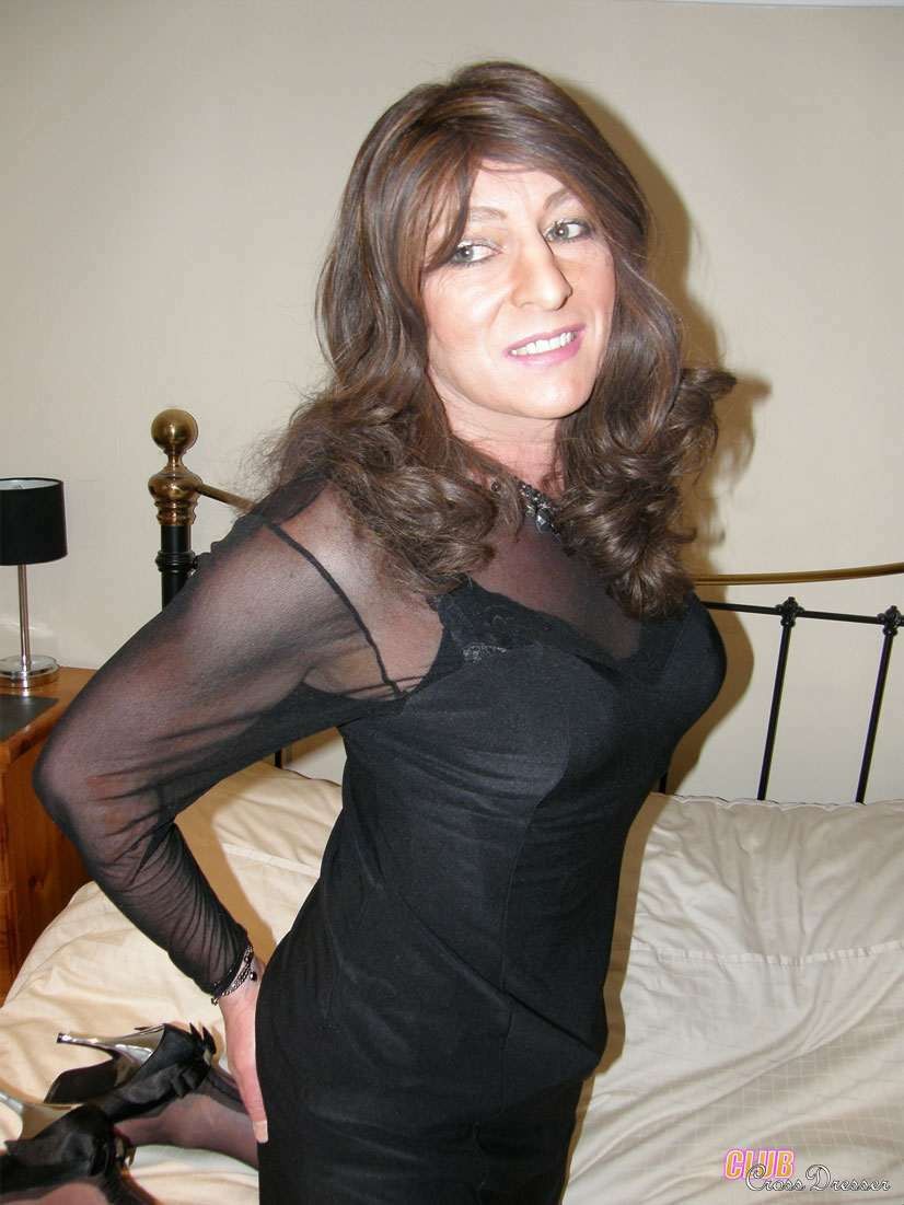Transvestite dressed in black #75769825