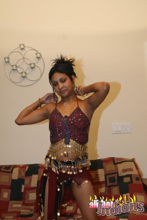 Ponytailed Indian wench strips and shows her round boobies #73332423