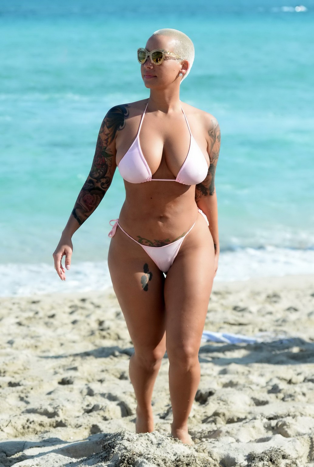 Amber Rose busty and booty wearing string bikini at the beach in Miami #75174905