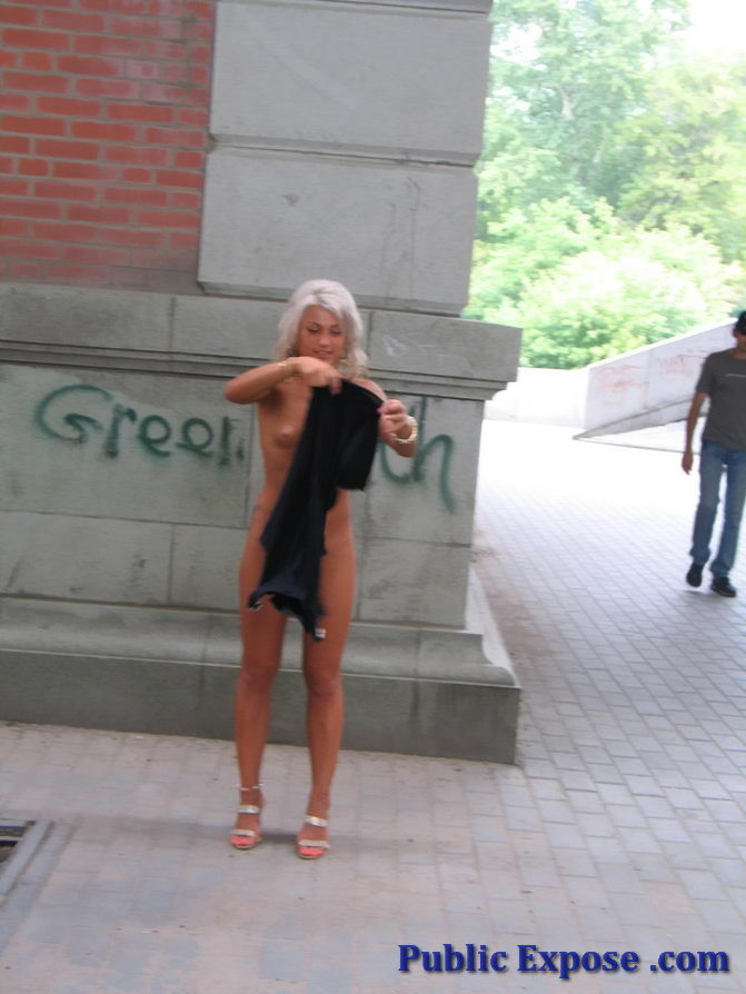 Tanned blonde girl takes off her dress in public #73782668