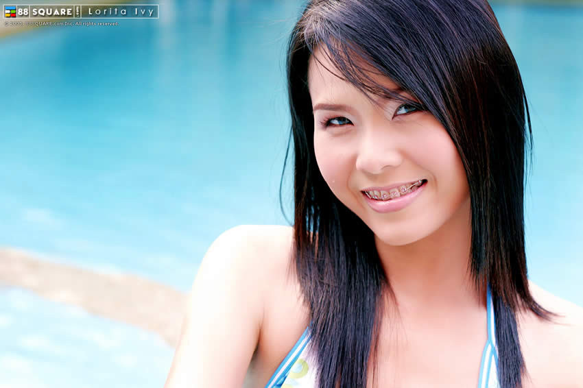 Adorable japanese teen posing by the pool #69946198