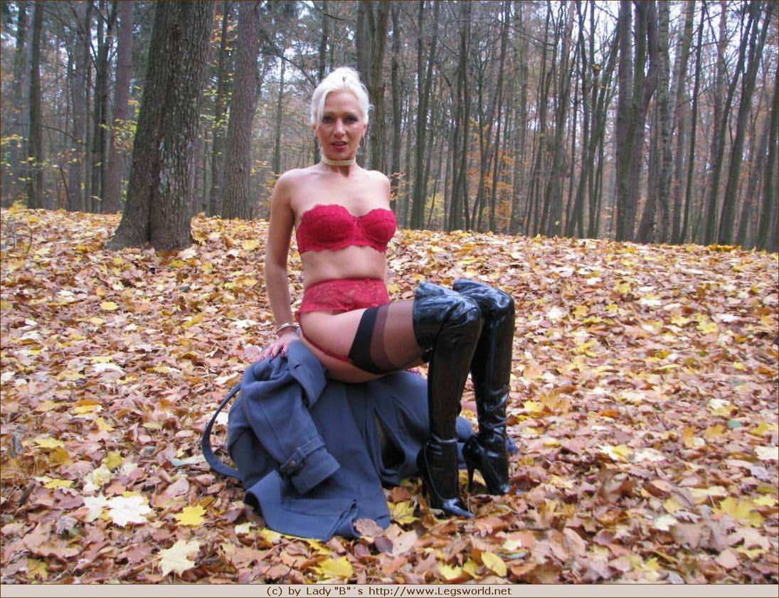 Blonde Ewa in stockings and high boots outdoors #76477904