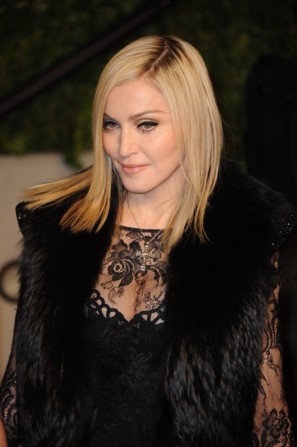 Madonna wearing black lace  fishnets at the Vanity Fair Oscar Party #75315711