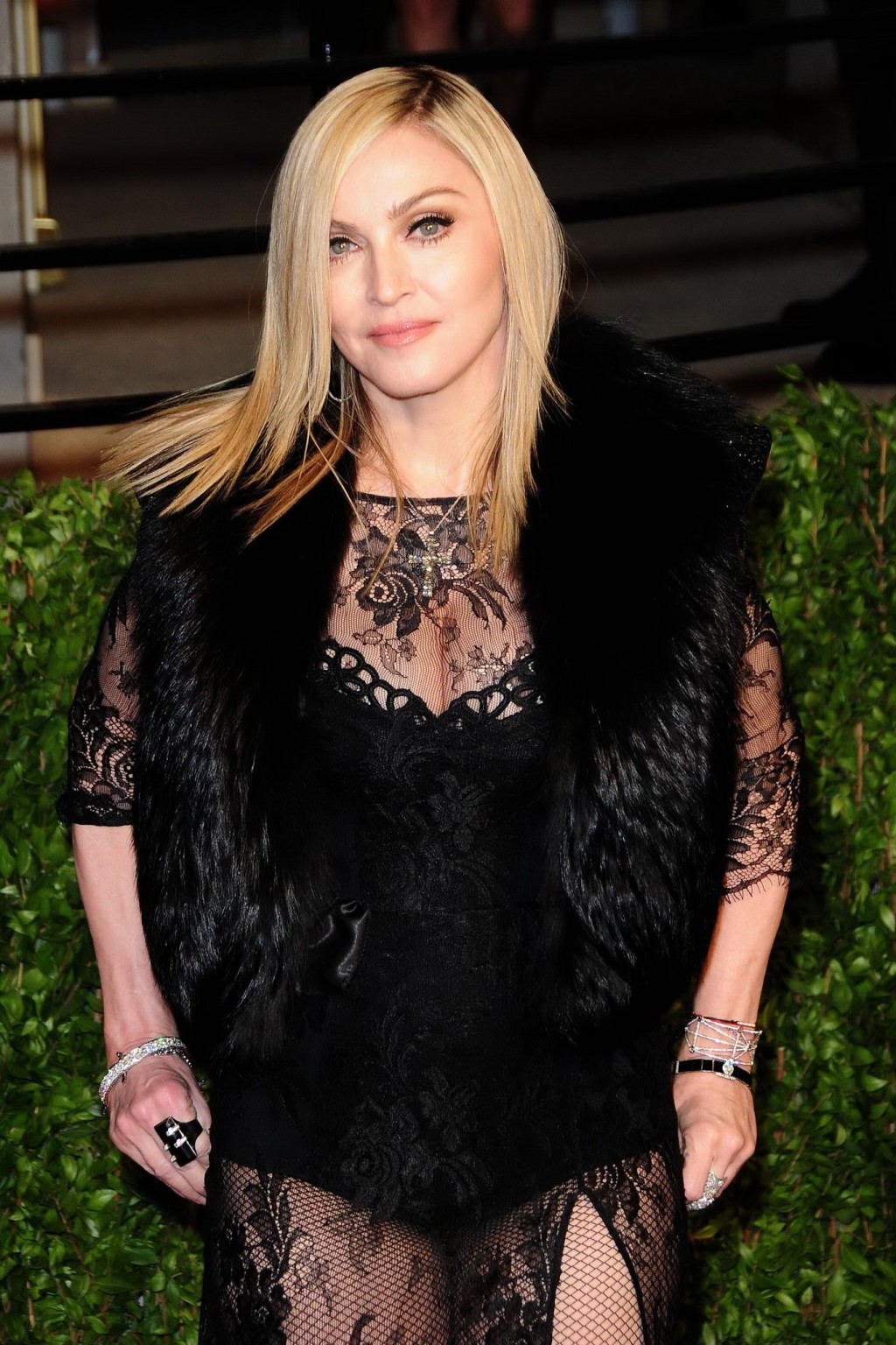 Madonna wearing black lace  fishnets at the Vanity Fair Oscar Party #75315871