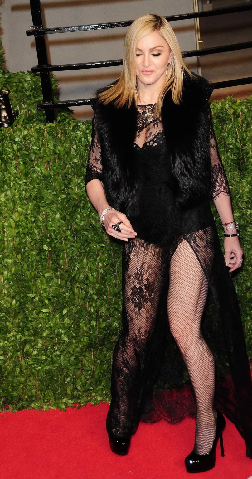Madonna wearing black lace  fishnets at the Vanity Fair Oscar Party #75315892