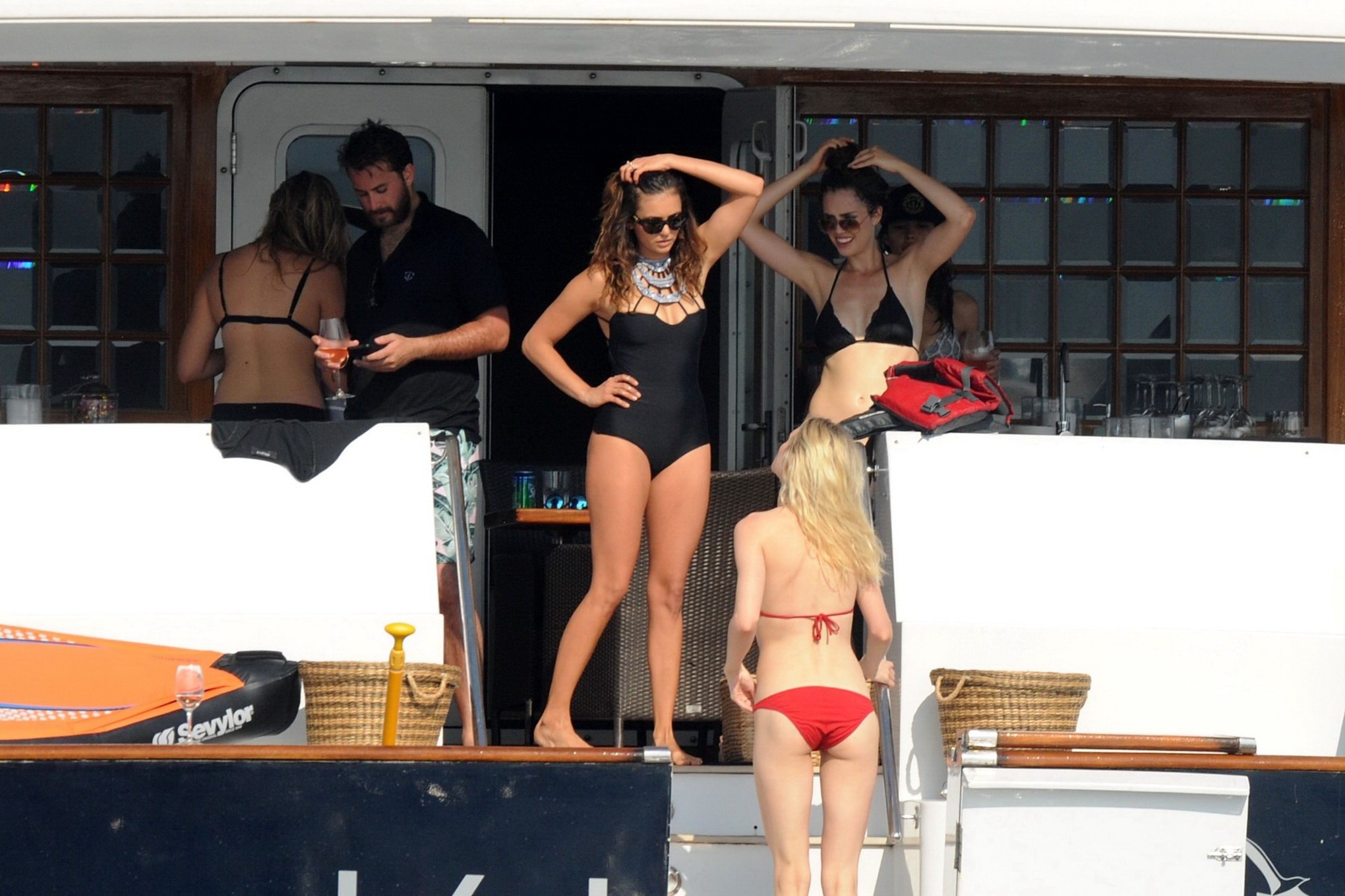 Nina Dobrev wearing a sexy black swimsuit on a yacht in St Tropez #75157791