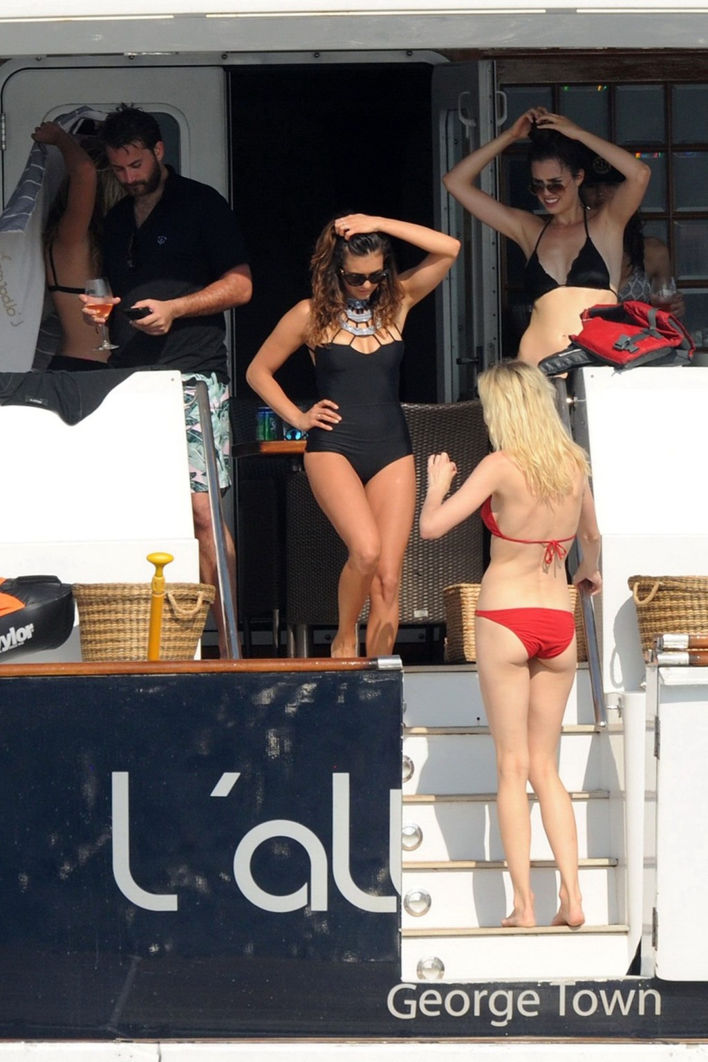 Nina Dobrev wearing a sexy black swimsuit on a yacht in St Tropez #75157826