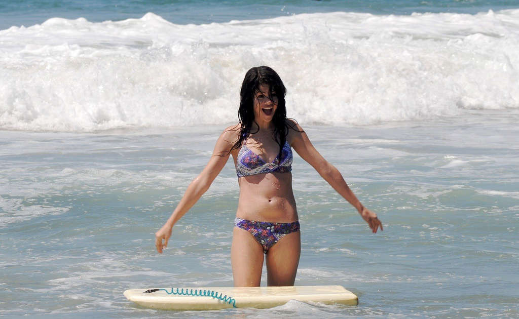 Selena Gomez exposing sexy body and hot ass in bikini on beach #75334739