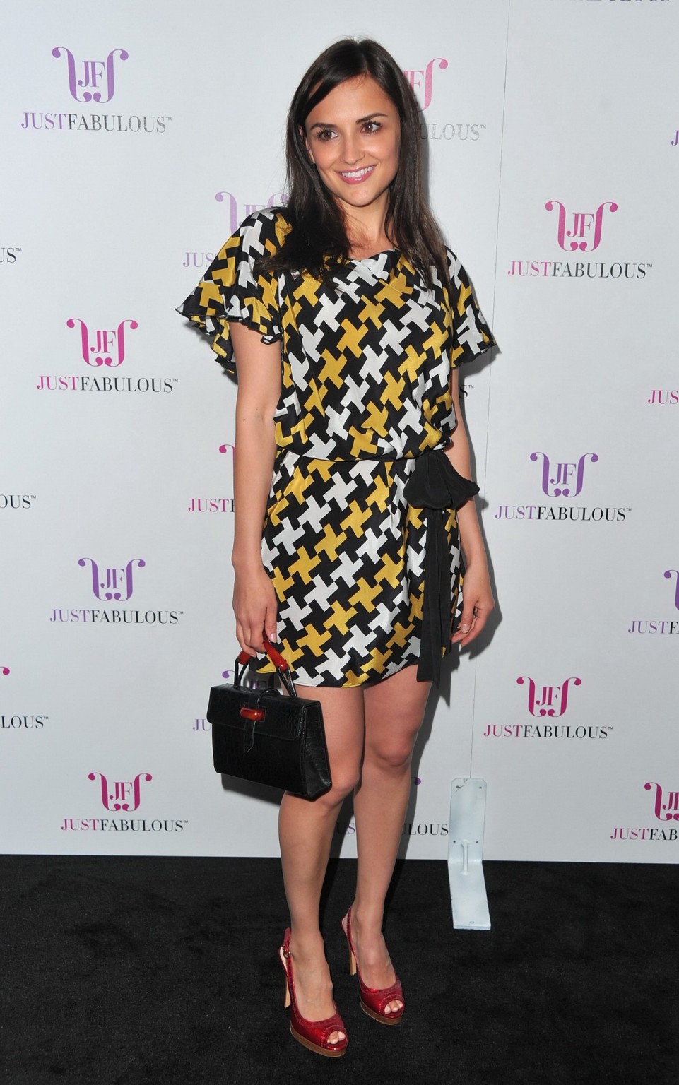 Rachael Leigh Cook leggy wearing mini dress at JustFabulous launch party in West #75309232