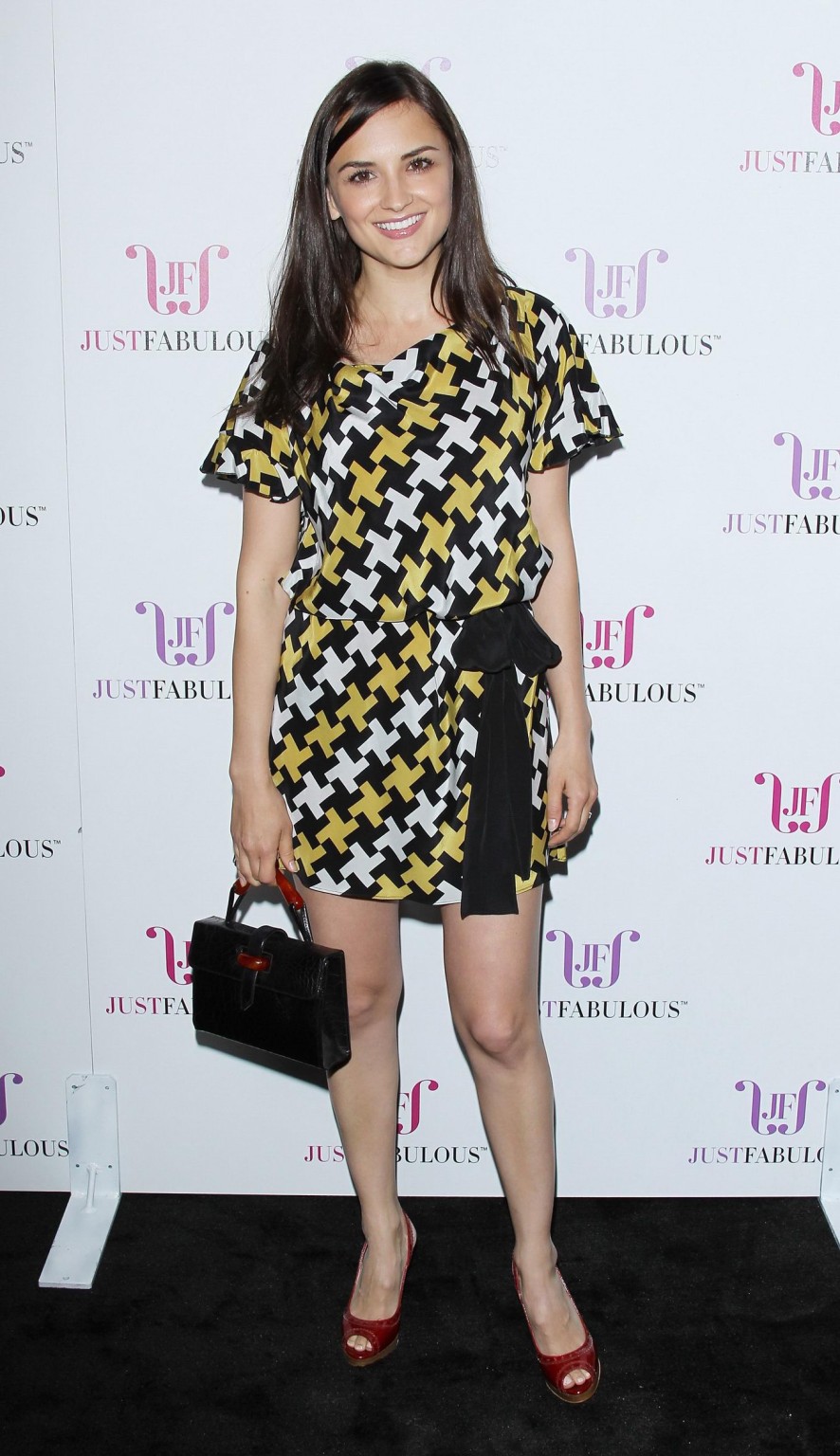 Rachael Leigh Cook leggy wearing mini dress at JustFabulous launch party in West #75309266