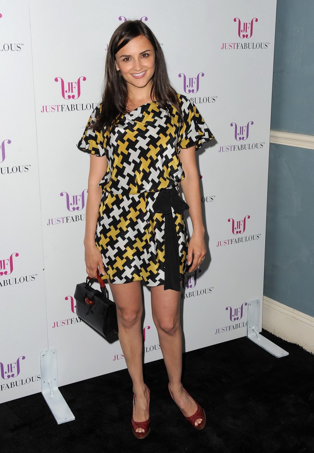 Rachael Leigh Cook leggy wearing mini dress at JustFabulous launch party in West #75309290