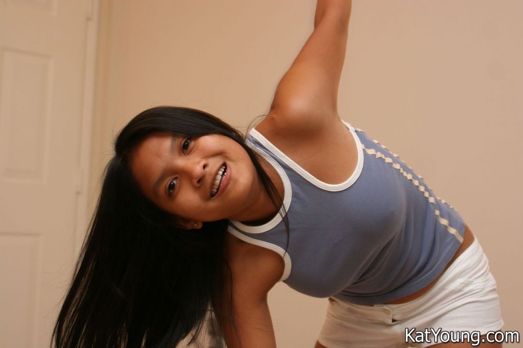 Kat Young Picture Gallery:: Lovely asian teen does her morning exercises topless #69933313