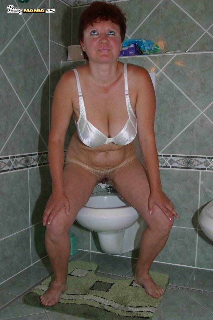 Old slut pissing #76580563