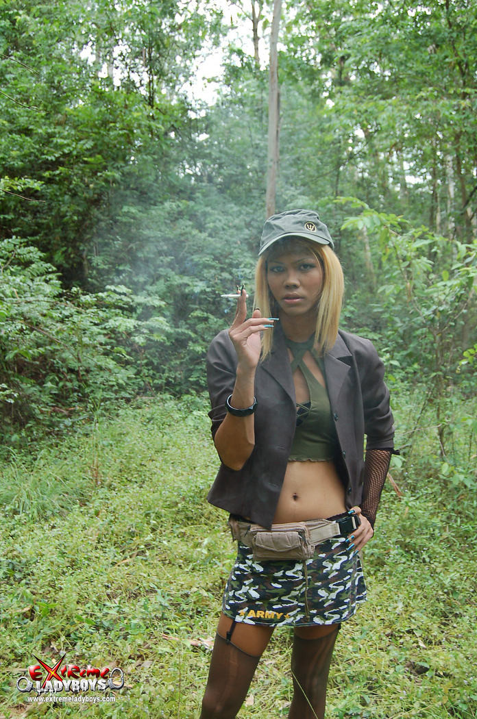 Ladyboy warrior in the forest #77929022
