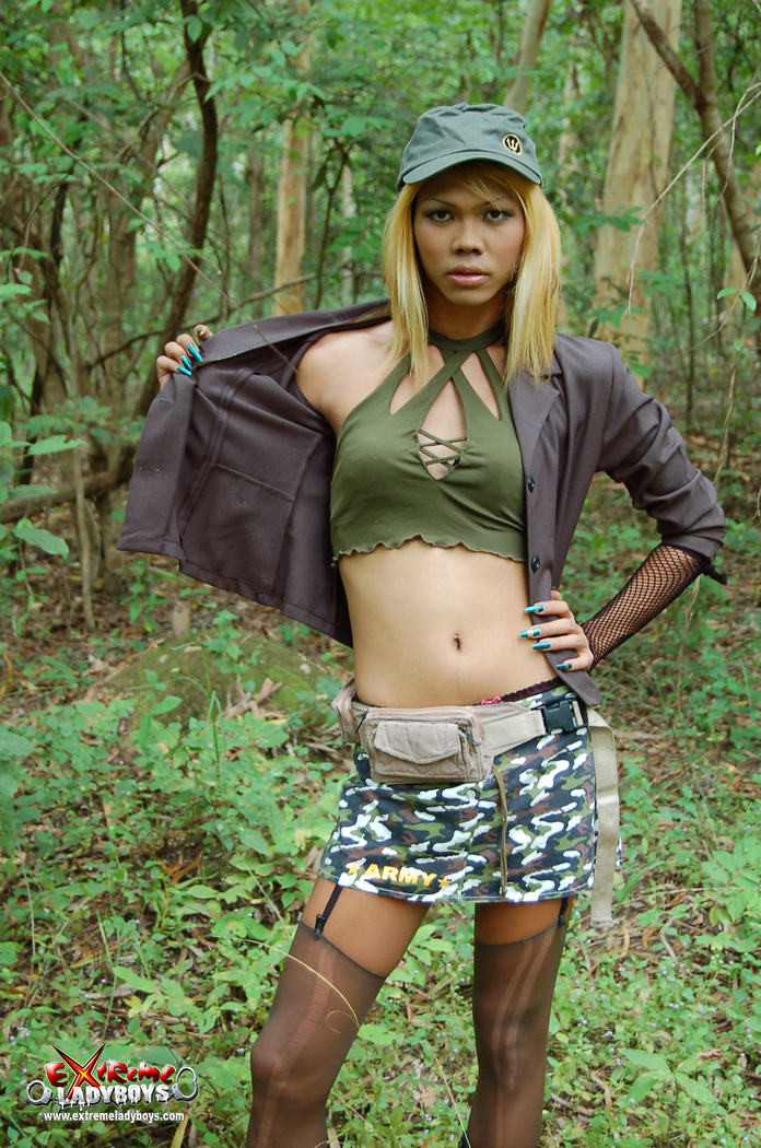 Ladyboy warrior in the forest #77929077
