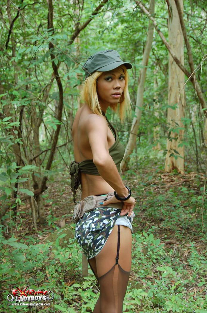 Ladyboy warrior in the forest #77929089