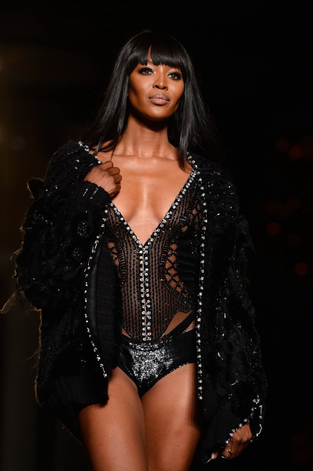 Naomi Campbell wearing black transparent lingerie on a catwalk during Versace sh #75226347