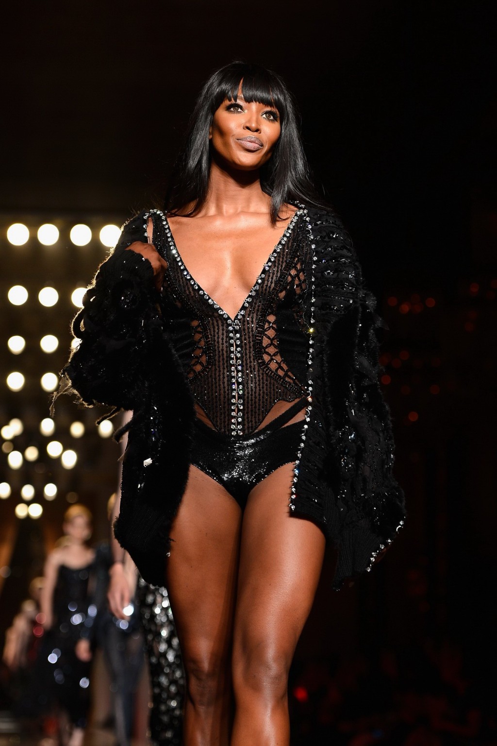 Naomi Campbell wearing black transparent lingerie on a catwalk during Versace sh #75226412