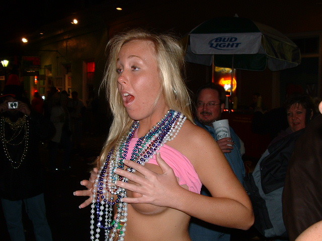 Drunk girls show boobs at mardis gras #76403255