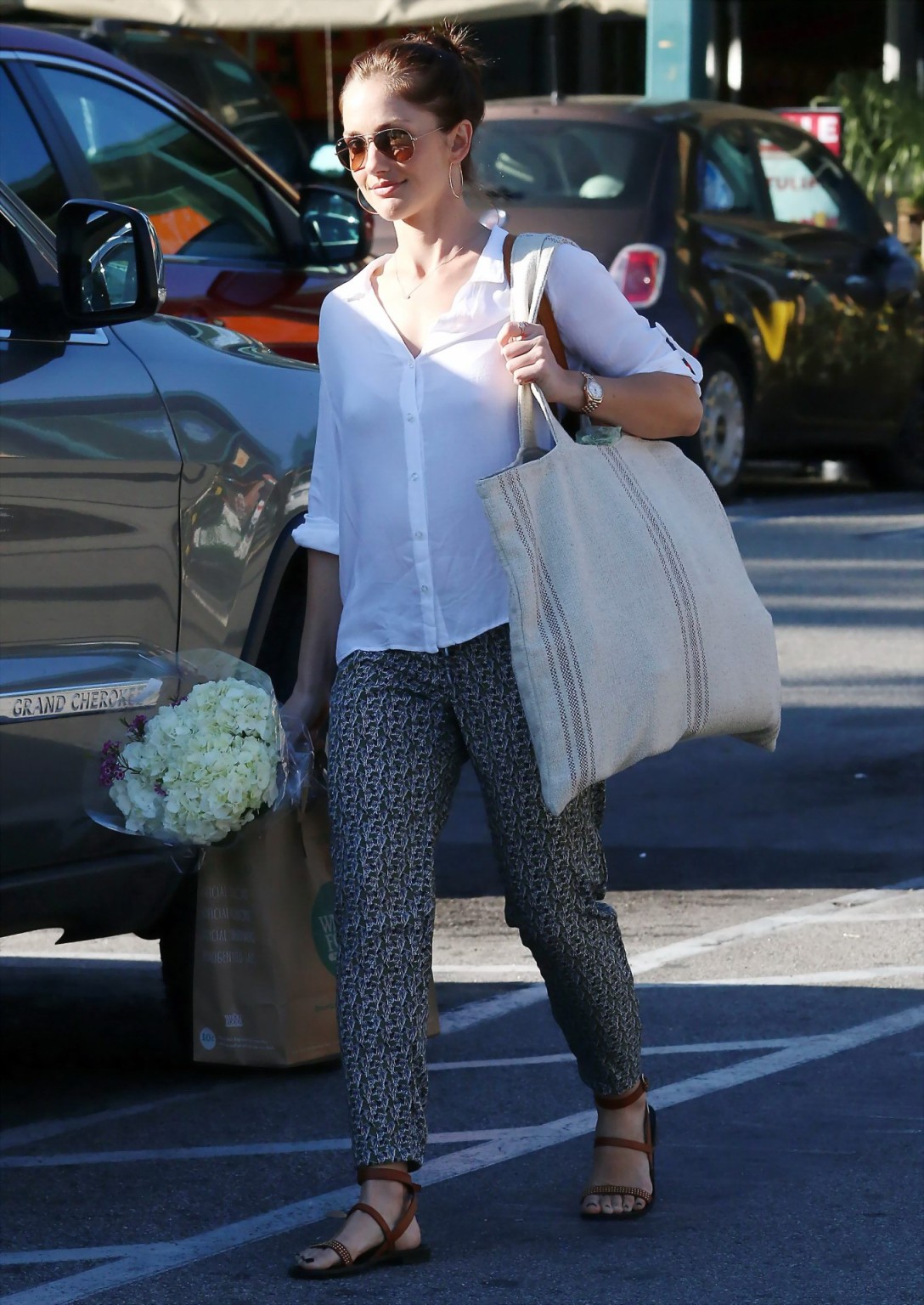 Minka Kelly showing pokies in white slightly transparent shirt while shopping in #75170731