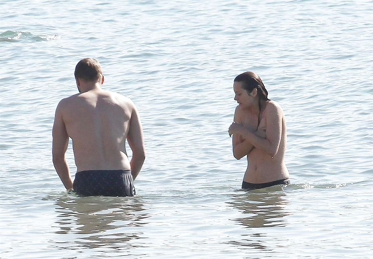 Marion Cotillard showing her nice big tits on beach with friend paparazzi pictur #75285681