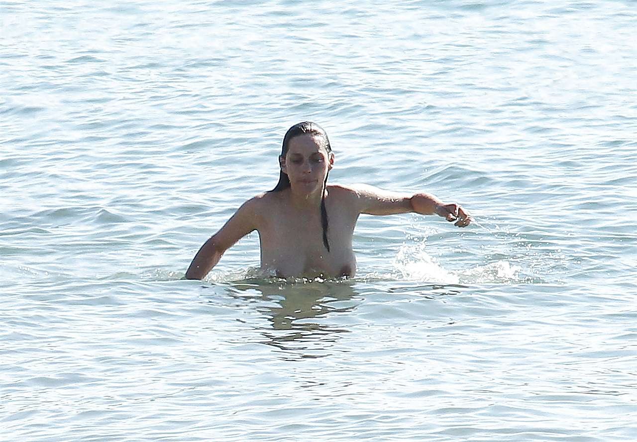 Marion Cotillard showing her nice big tits on beach with friend paparazzi pictur #75285707