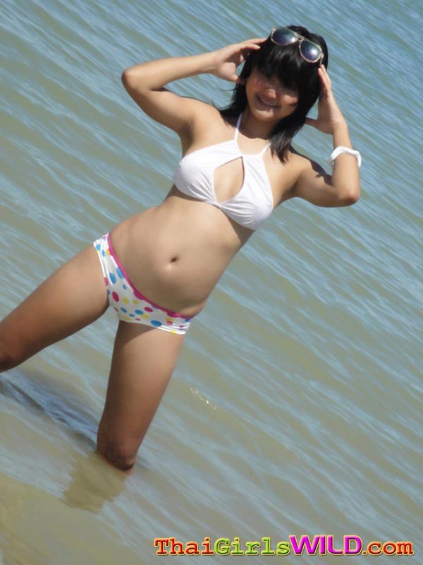 Cute little Thai amateur Febe poses at the beach and flashes #69758770