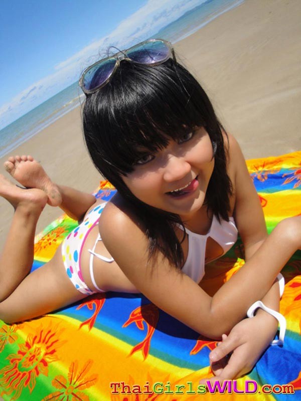 Cute little Thai amateur Febe poses at the beach and flashes #69758811