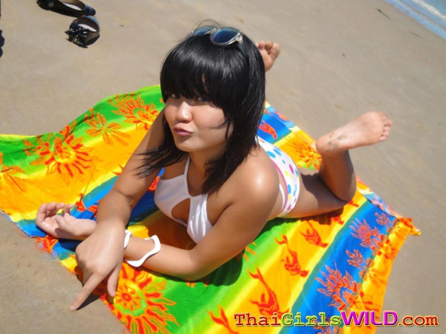 Cute little Thai amateur Febe poses at the beach and flashes #69758814
