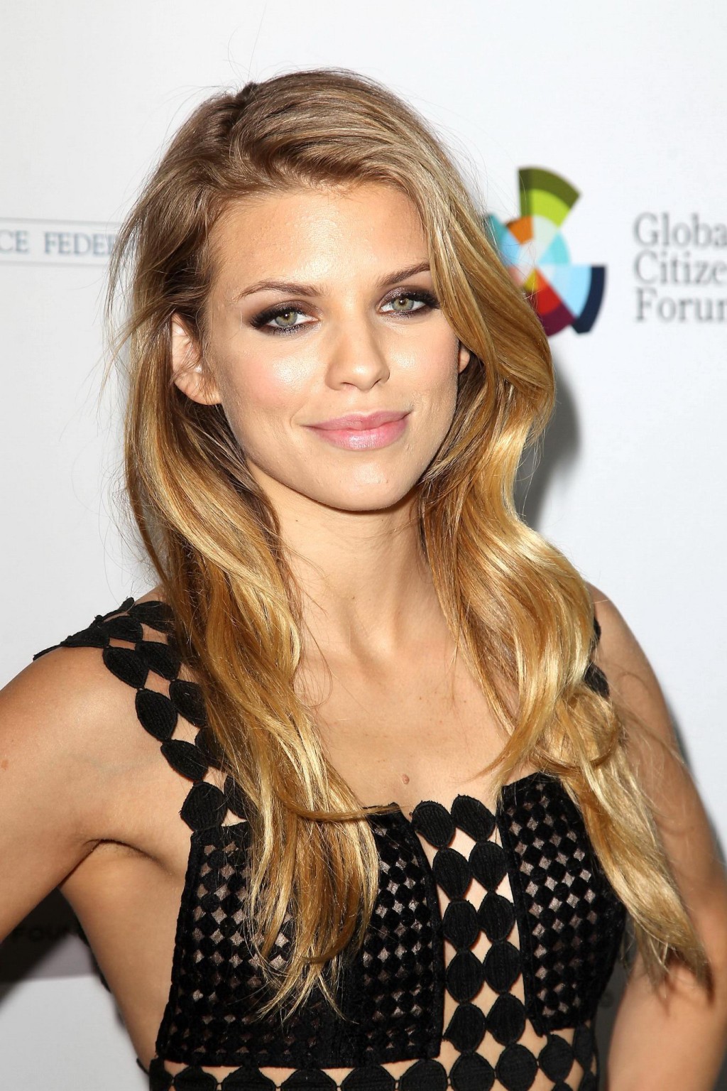 AnnaLynne McCord braless wearing a partially see through dress at the UN Women f