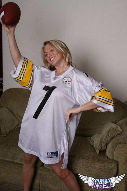 Horny blonde stripped down nude football fan babe #70492188