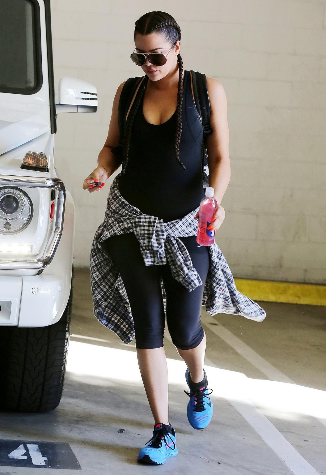 Khloe Kardashian busty wearing a black tanktop outside a gym in Beverly Hills #75179833