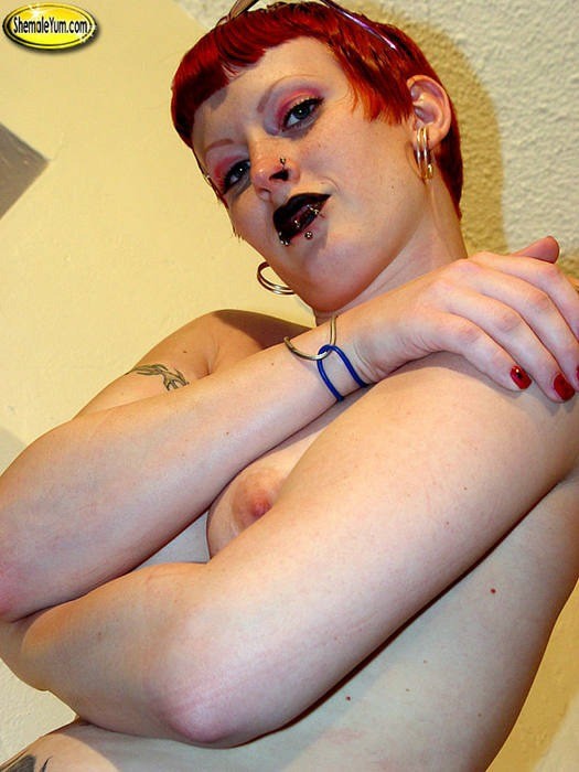 Goth tranny takes off her latex dress #79270130