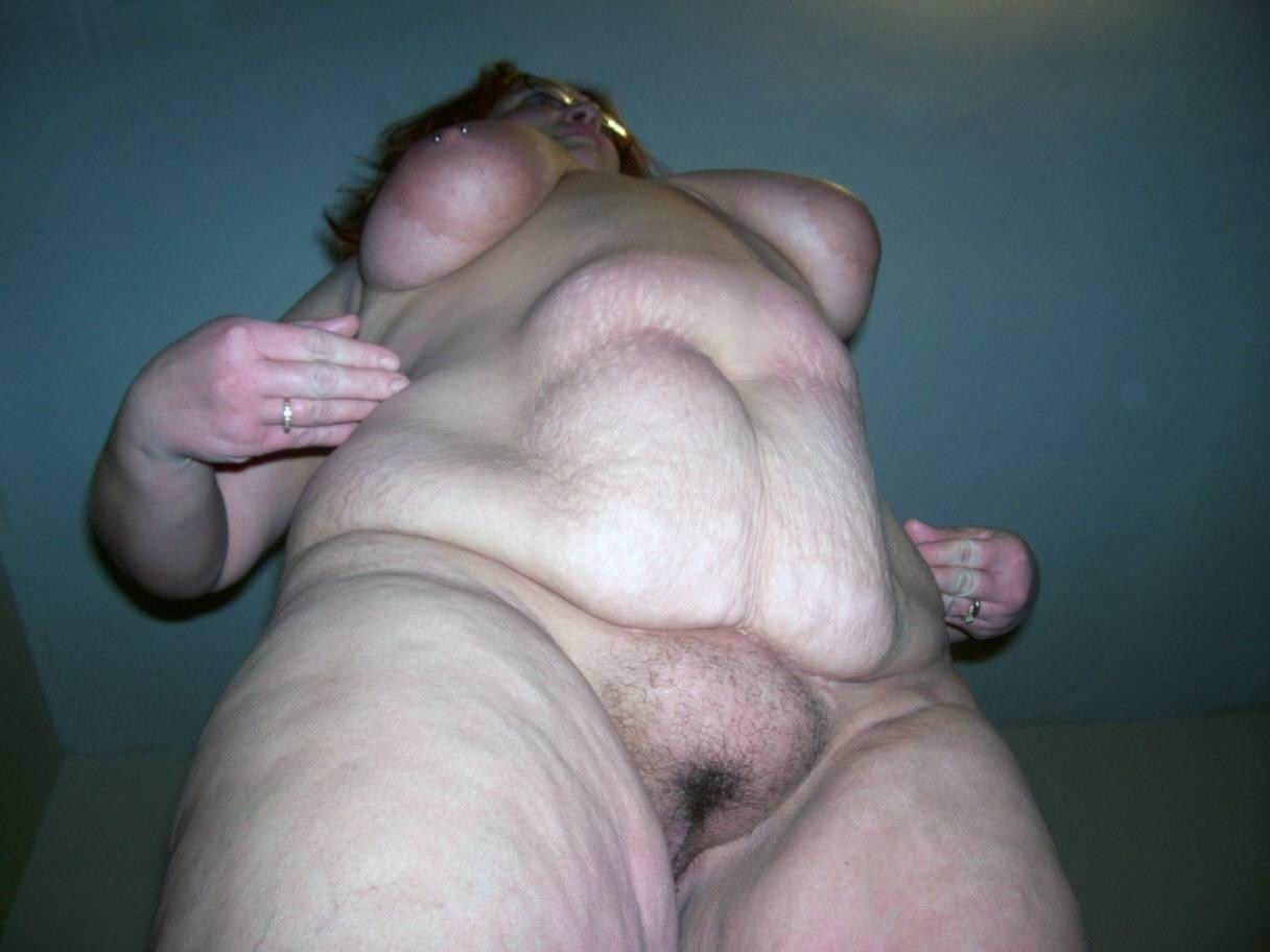 Fat ladies showing their huge bellies #75492840
