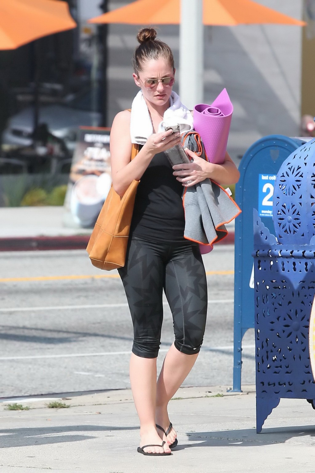 Minka Kelly busty showing pokies in tiny black top and leggings while leaving a  #75172453