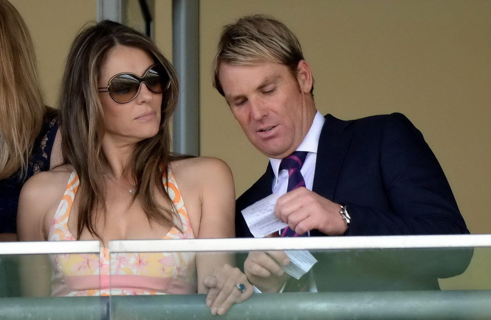 Elizabeth Hurley showing huge cleavage and getting her ass grpoped at Betfair We #75223447