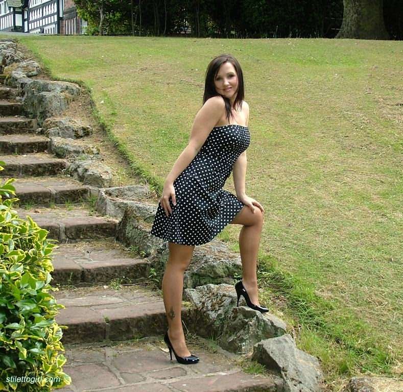 Stiletto stocking girl posing outdoors #72666700