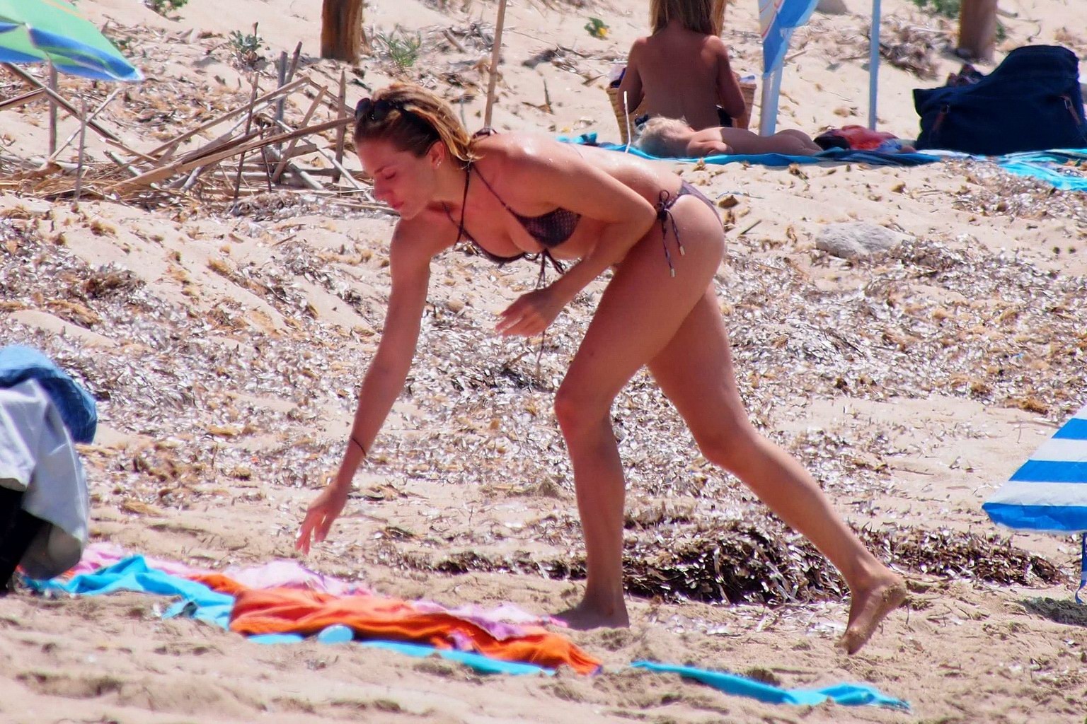 Sienna Miller wearing a snake print bikini in Formentera #75159482