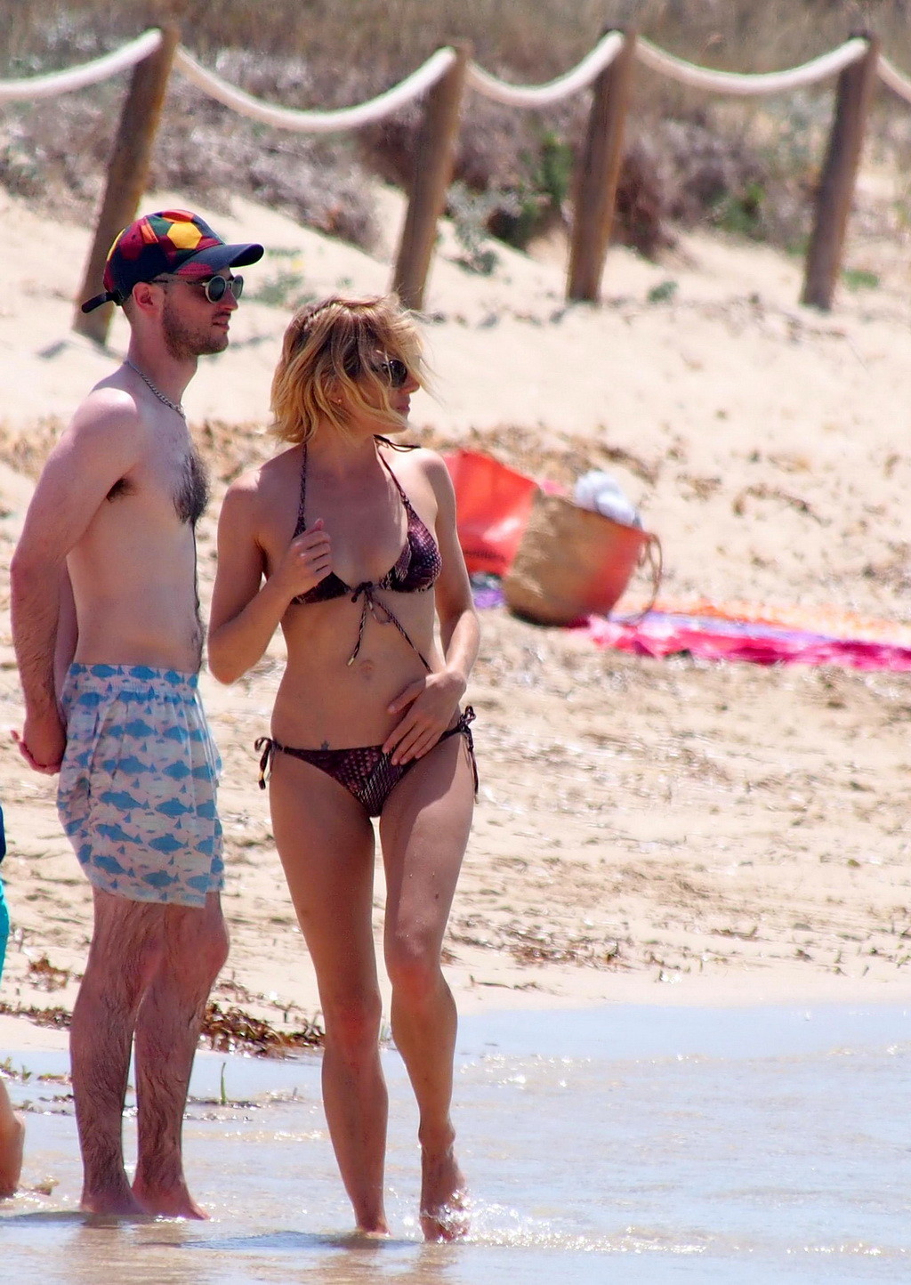Sienna Miller wearing a snake print bikini in Formentera #75159509