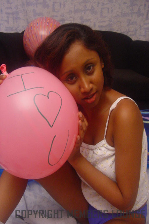 Lovely Indian girl plays with balloons #69745677