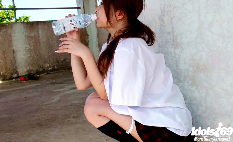 Cute japanese girl in a school uniform #69944342