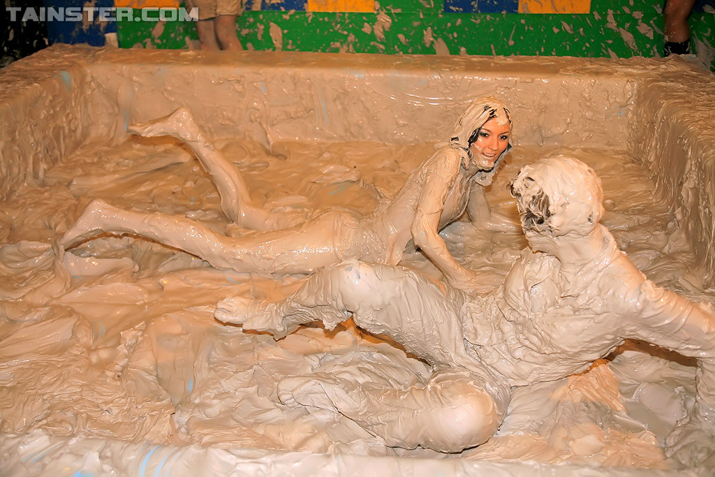 Adorable lesbians enjoy wrestling in a tub of dirt and mud #71478530