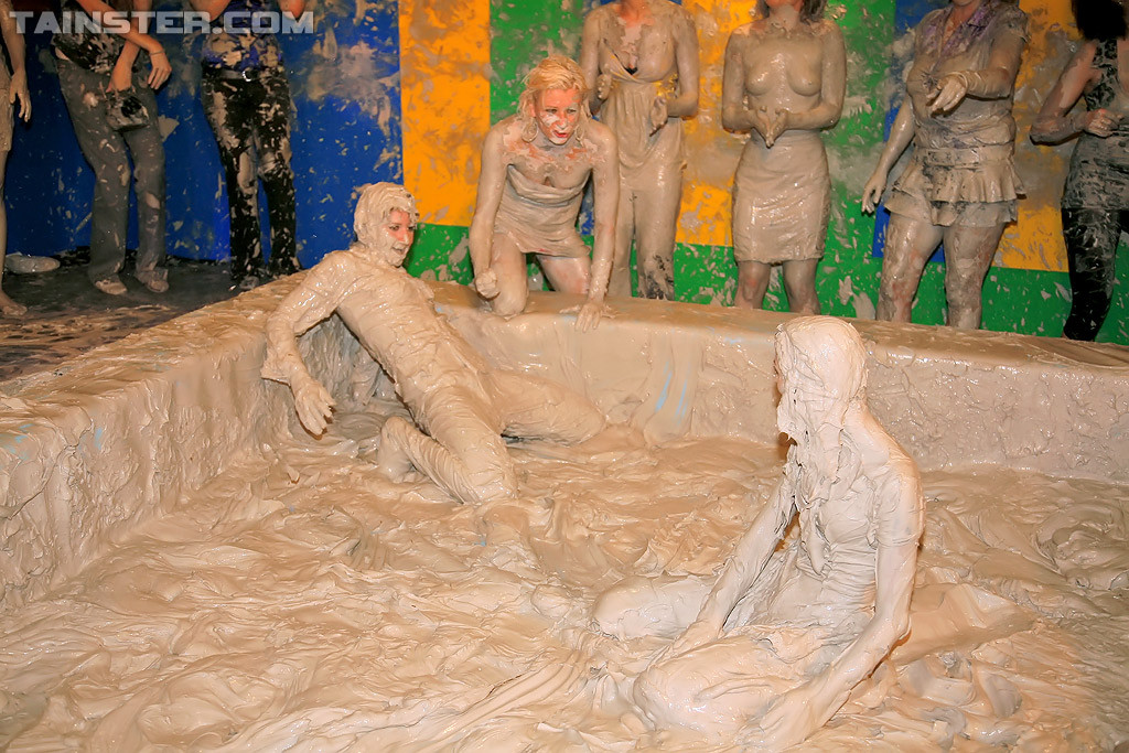 Adorable lesbians enjoy wrestling in a tub of dirt and mud #71478547