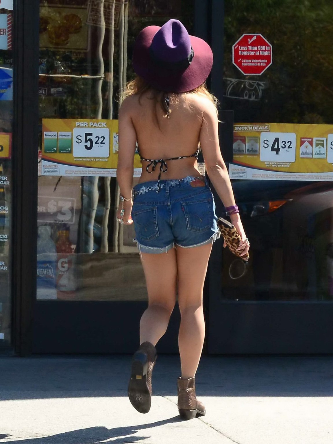 Vanessa Hudgens shows off her ass  legs wearing hotpants  ankle boots at a gas s #75220452