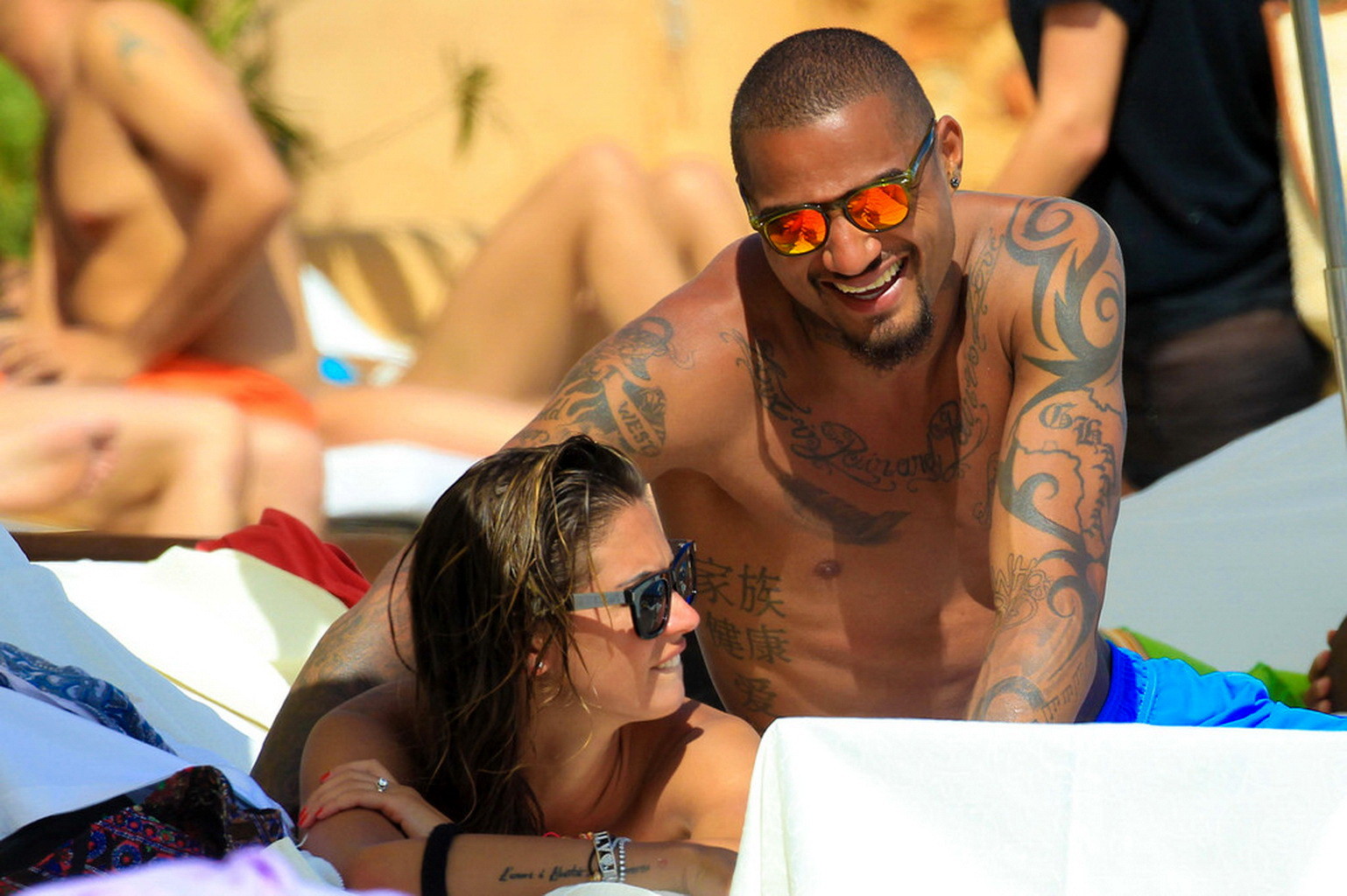 Busty Melissa Satta wearing a tube bikini on a beach in Ibiza #75229336