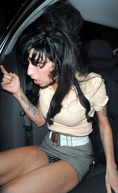 Amy Winehouse showing her panties upskirt in car paparazzi pictures #75401533