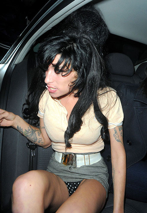 Amy Winehouse showing her panties upskirt in car paparazzi pictures #75401568