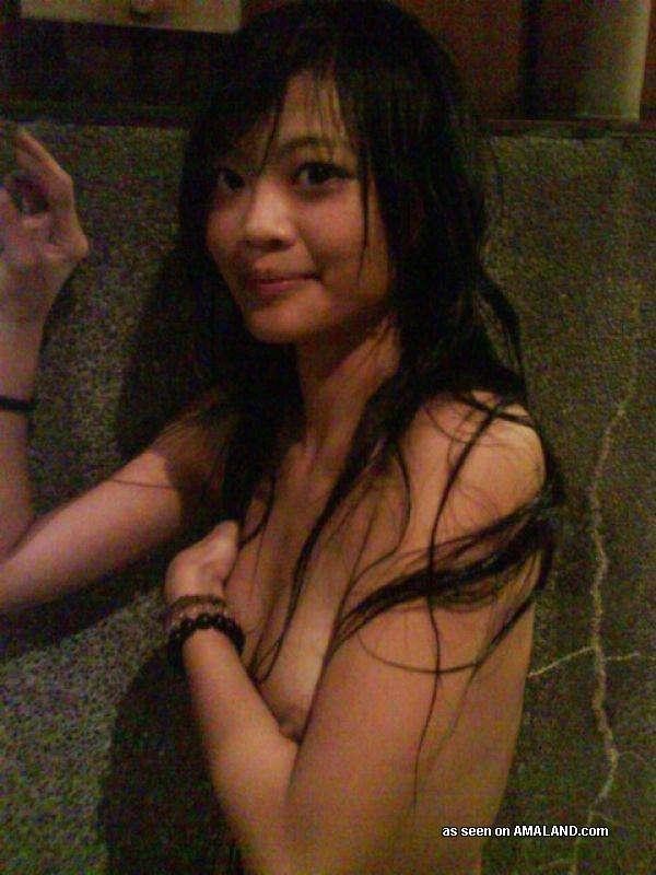 Naughty Asian teens go topless at the spa #69752674