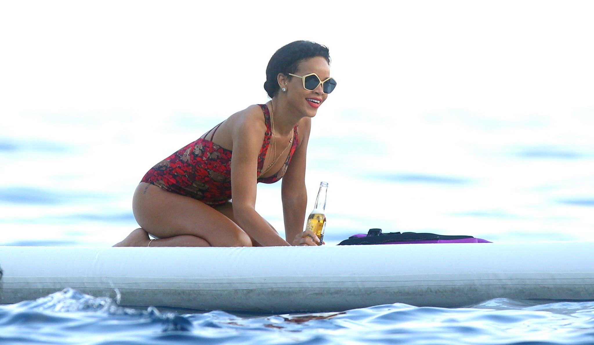 Rihanna showing off her ass in sexy red swimsuit on a yacht in France #75256100