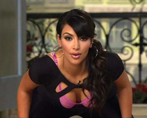 Kim Kardashian exposing fucking huge boobs and licking her finger #75285777